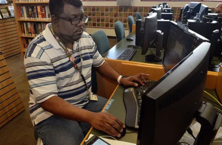 Etienne Douglas manages the Webstars program at the Marin City Library, teaching high school students how to use a variety of computer programs. Robert Tong — Marin Independent Journal